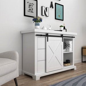 mini rolling barn doors on a dresser